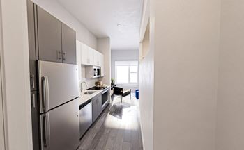 Kitchen No backsplash quartz at Link Apartments® Mint Street, Charlotte, 28203